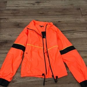 Neon orange windbreaker